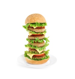Photo of Tasty huge burger with cheese on white background