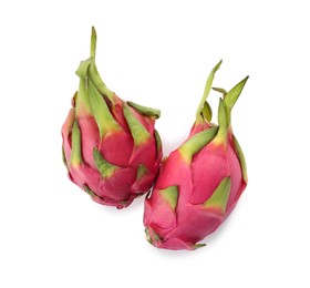 Delicious pink dragon fruits (pitahaya) on white background, top view
