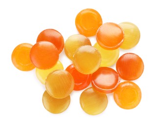 Many different color cough drops on white background, top view