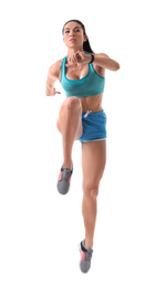 Athletic young woman running on white background
