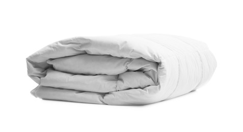 Photo of Folded soft blanket on white background. Household textile