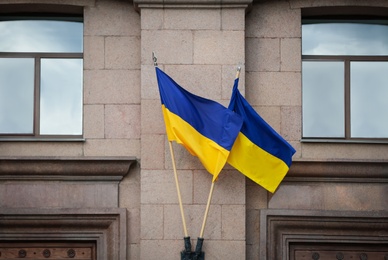 National flags of Ukraine on building facade