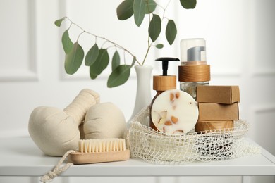 Eco friendly personal care products on white table indoors