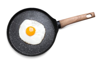 Frying pan with delicious fried egg isolated on white, top view