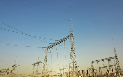 Modern electrical substation on sunny day, low angle view