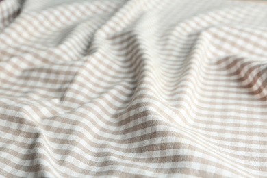 Texture of white checkered fabric as background, closeup