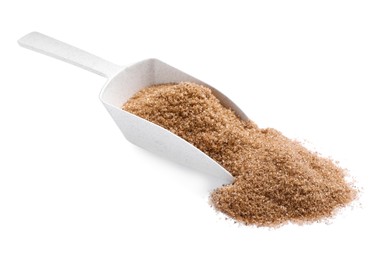 Brown salt and scoop on white background