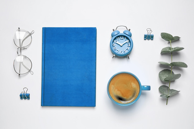 Flat lay composition inspired by color of the year 2020  (Classic blue) on white background