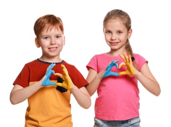Little girl and boy making heart with their hands painted in Ukrainian flag colors on white background. Love Ukraine concept