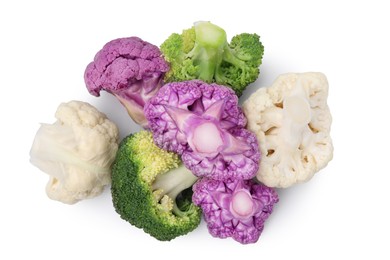 Heap of various cauliflower cabbages on white background, top view
