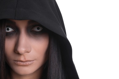 Mysterious witch with spooky eyes on white background, closeup