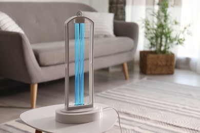 UV lamp for light sterilization on table in living room