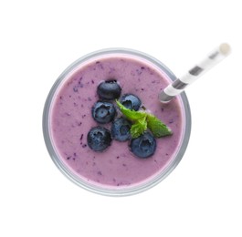 Glass of blueberry smoothie with straw and mint isolated on white, top view