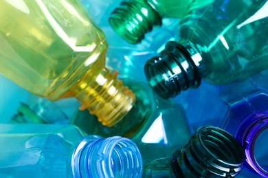 Used plastic bottles as background, closeup. Recycling problem