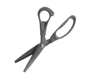 New pair of sewing scissors on white background