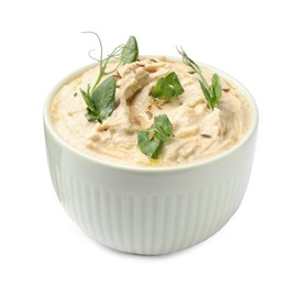 Photo of Bowl of tasty hummus with pea leaves isolated on white