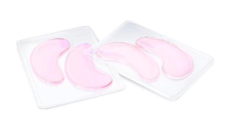 Packages with under eye patches isolated on white. Cosmetic product