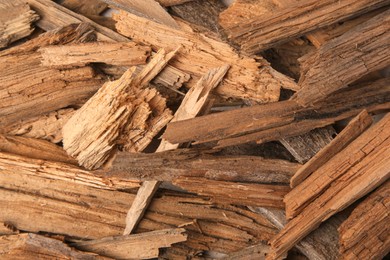 Photo of Many wood chips as background, closeup view