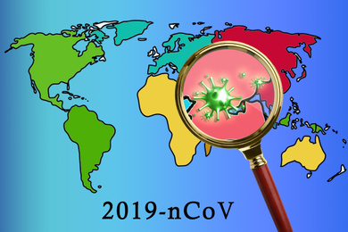 Magnifying glass and illustration of world map. Coronavirus outbreak