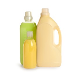 Photo of Different bottles with detergents on white background