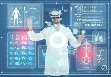 Medical technology concept. Doctor using virtual reality headset to study health data of patient