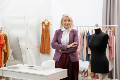 Confident female business owner in her boutique