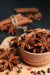 Aromatic anise stars and spices on tray, closeup