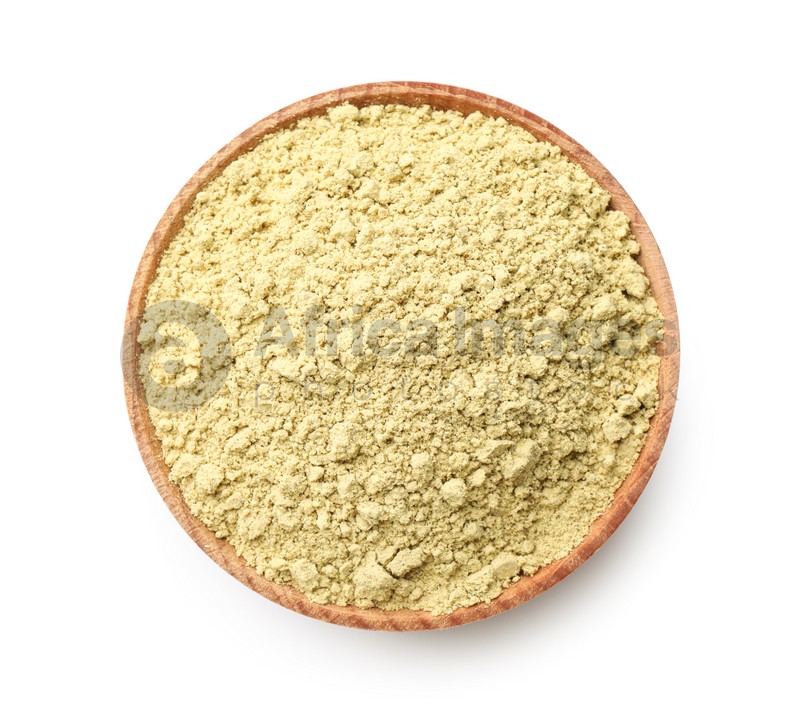 Photo of Wooden bowl with mustard powder isolated on white, top view