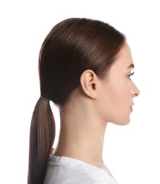 Profile portrait of young woman on white background