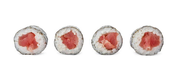 Delicious sushi rolls with tuna on white background