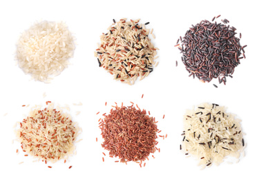 Set with different types of rice on white background, top view