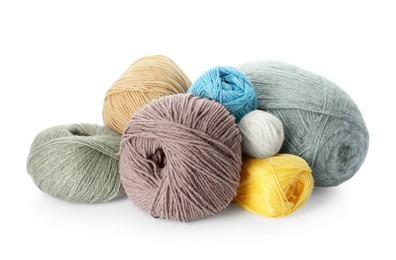 Photo of Different balls of woolen knitting yarns on white background