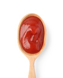 Ketchup in wooden spoon isolated on white. Top view, closeup