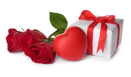 Beautiful gift box, roses and red heart on white background. Valentine's day celebration