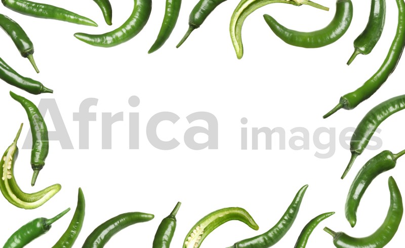 Image of Frame made of green chili peppers on white background 