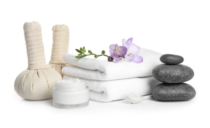 Beautiful spa composition with herbal bags on white background