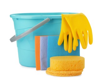 Light blue plastic bucket and cleaning tools on white background