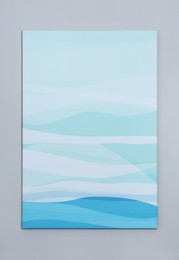 Beautiful abstract painting hanging on grey wall