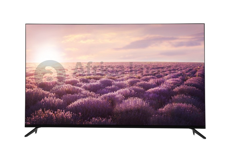 Image of Modern wide screen TV monitor showing beautiful lavender field at sunrise isolated on white