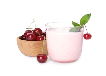 Tasty fresh milk shake with cherries on white background