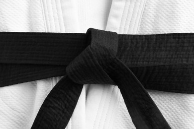 Martial arts uniform with black belt, closeup