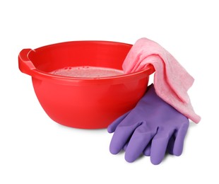 Red basin with detergent, rag and gloves on white background