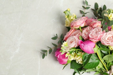 Photo of Bouquet of beautiful fragrant flowers on table