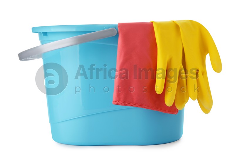 Blue bucket with rag and gloves isolated on white