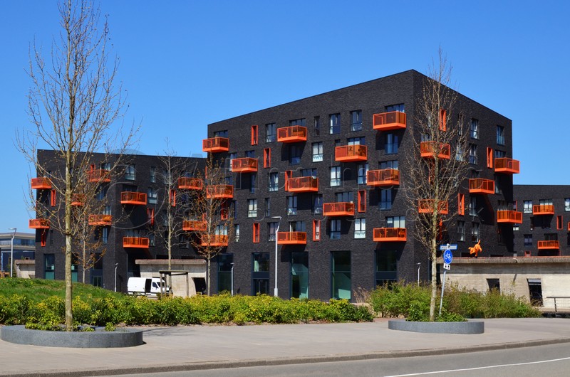 Photo of Exterior of beautiful modern residential complex on sunny day