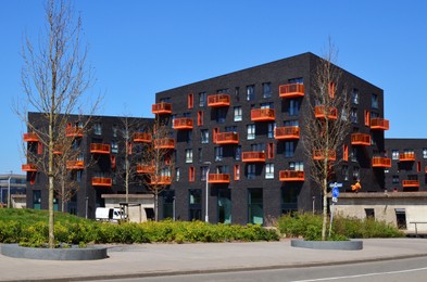 Exterior of beautiful modern residential complex on sunny day