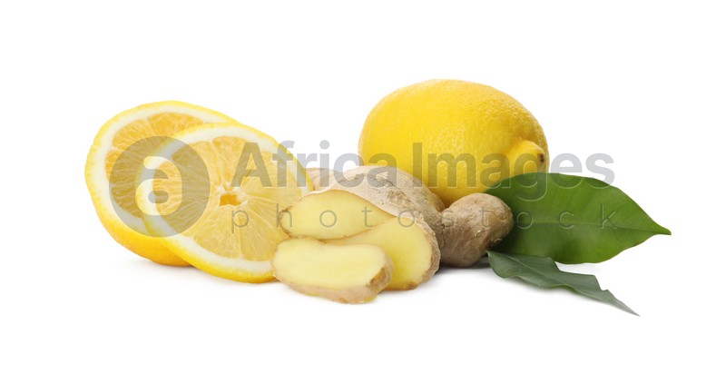 Photo of Fresh lemons and ginger on white background