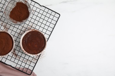 Delicious fresh chocolate fondant on white table, flat lay. Space for text