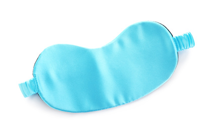 Turquoise sleeping eye mask isolated on white, top view. Bedtime