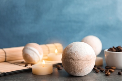 Photo of Bath bomb, coffee beans and candles on table